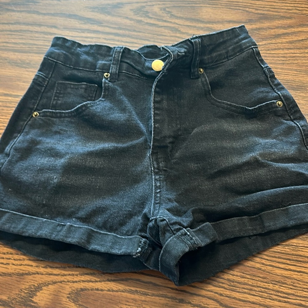 woman’s black denim shorts